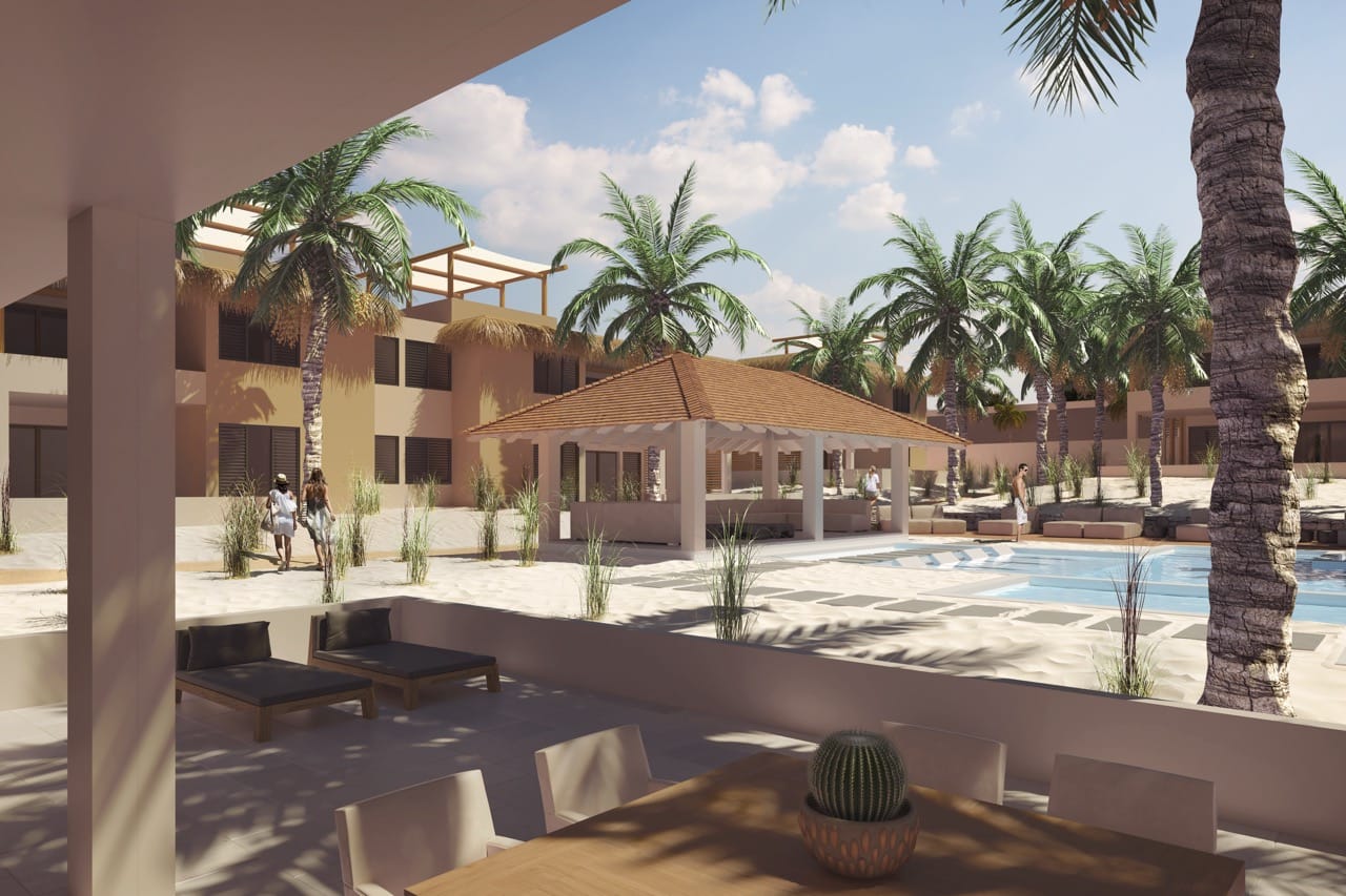 Zwembad met pooldeck en palmen